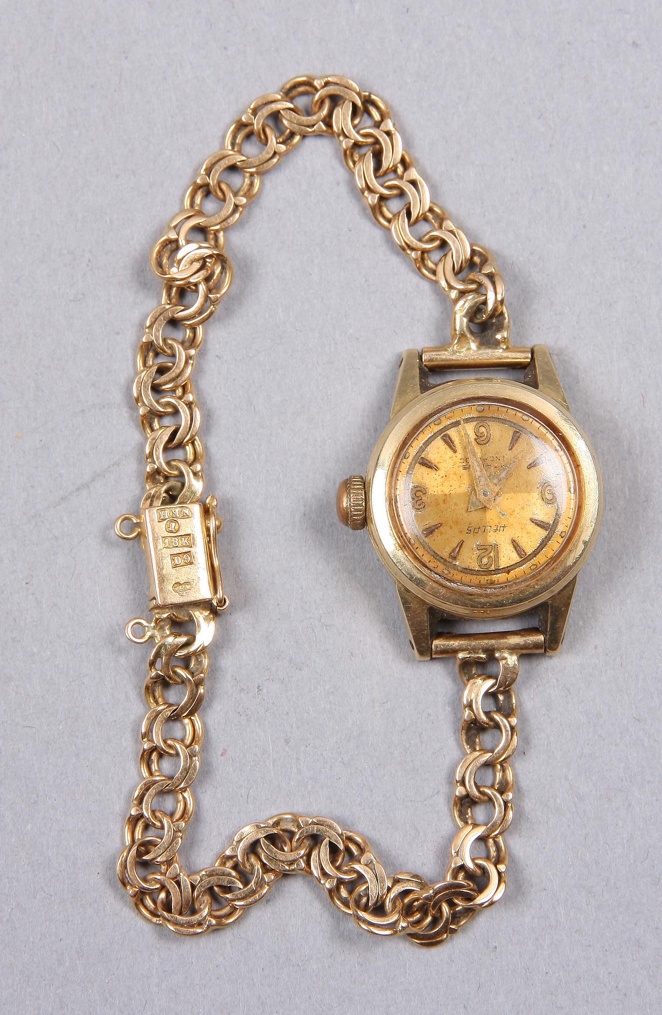 ARMBANDSUR, Hellas, 14K resp 18K guld, 1900-talets mitt, vikt 16 gram.