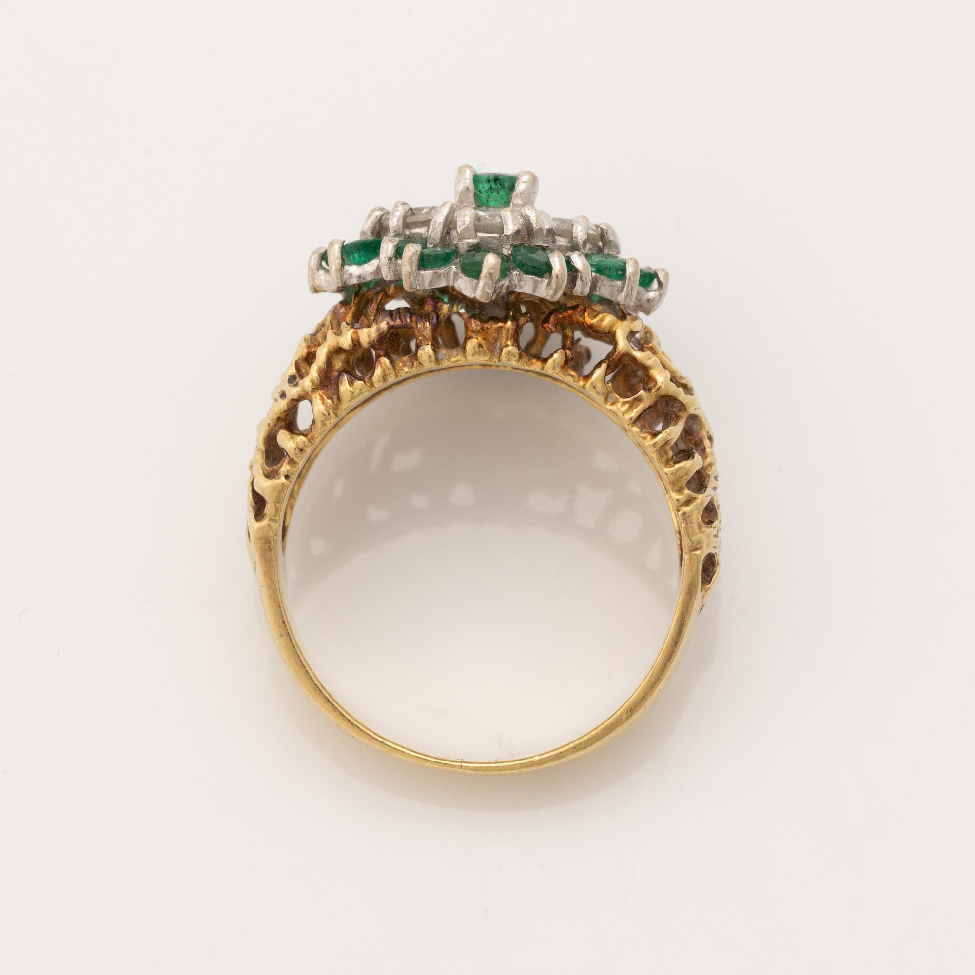 18K gold and brilliant cut diamond and emerald ring.