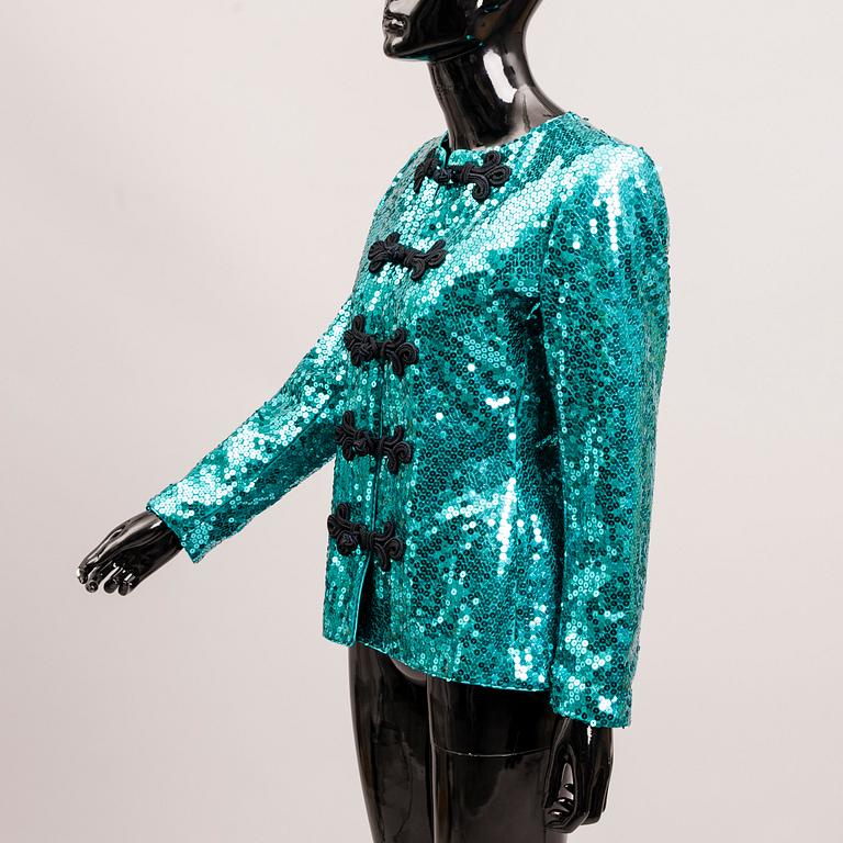 KAVAJ, Yves Saint Laurent.