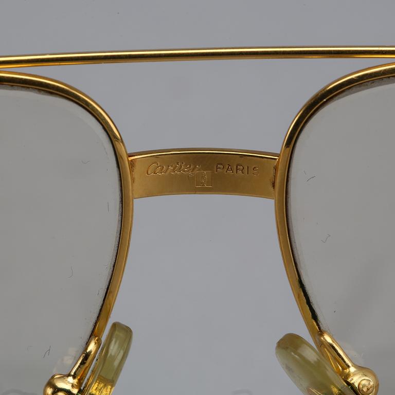 CARTIER, glasses.