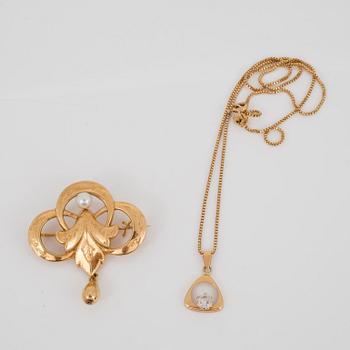 HÄNGE, KEDJA samt BROSCH, 18K guld, 1900-talets andra hälft.