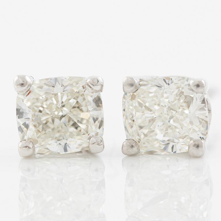 Earrings, a pair, 18K white gold with cushion-cut diamonds totalling 1.44 ct, accompanied by GIA dossier.