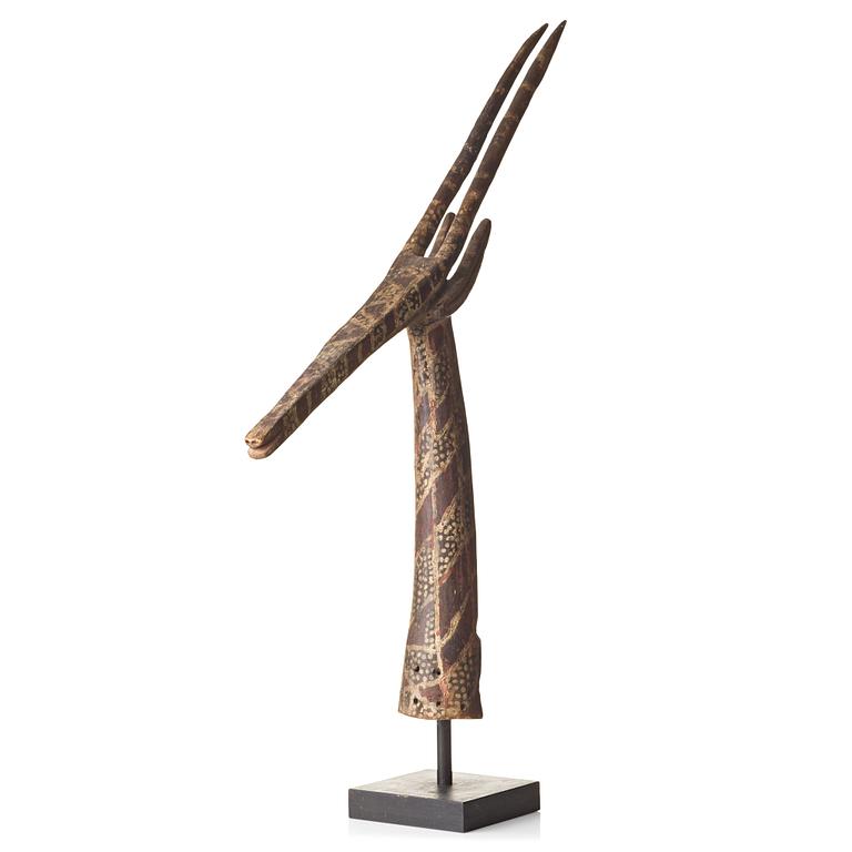 HEADDRESS, Antelope (Adoné), painted wood, height 116 cm, Kurumba peoples, Mali, the second half of the 20th century.