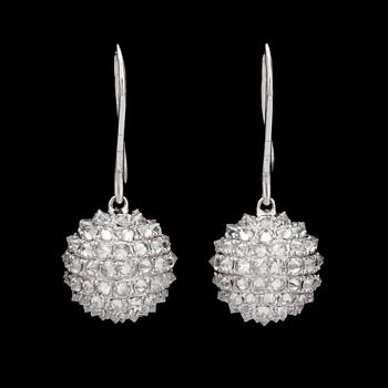 42. A pair of diamond, circa 4.87 cts in total, earrings.