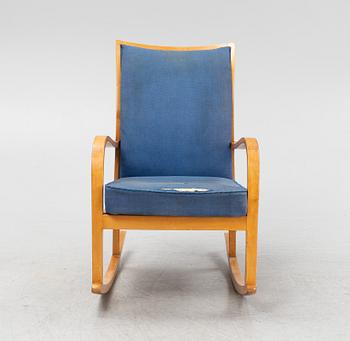 A birch rocking chair, Knoll, mid 20th century.