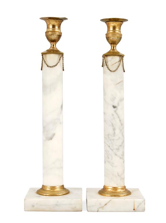 A pair of Gustavian candlesticks.