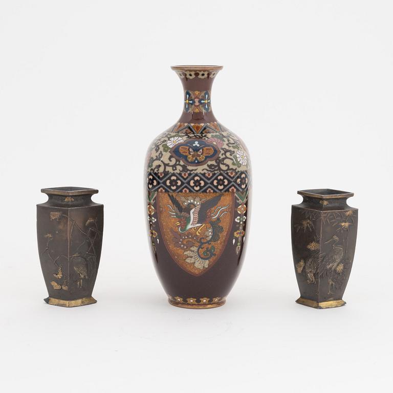 A pair of Japanese gilt bronze vases and a cloisonné vas, Meiji period (1868-1912).