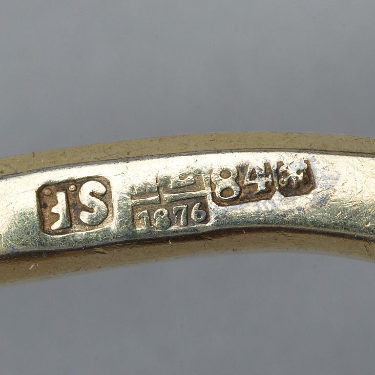 A Russian 19th century parcel-gilt caviar-spoon, marks of Samuel Z. Filander, S:t Petersburg 1876.