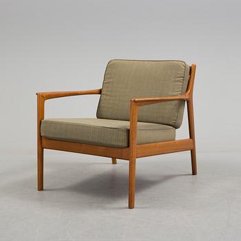 An 'USA 75' easy chair by Folke Ohlsson, Dux.