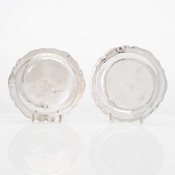 A 12-piece set of sterling silver dishes / coasters, Peru 1950s-60s.