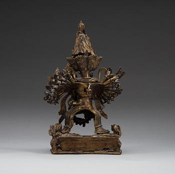 A Tibetian bronze figure, 19th Century.