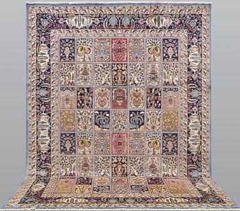 A Figural Sarouk carpet, c. 348 x 240 cm.