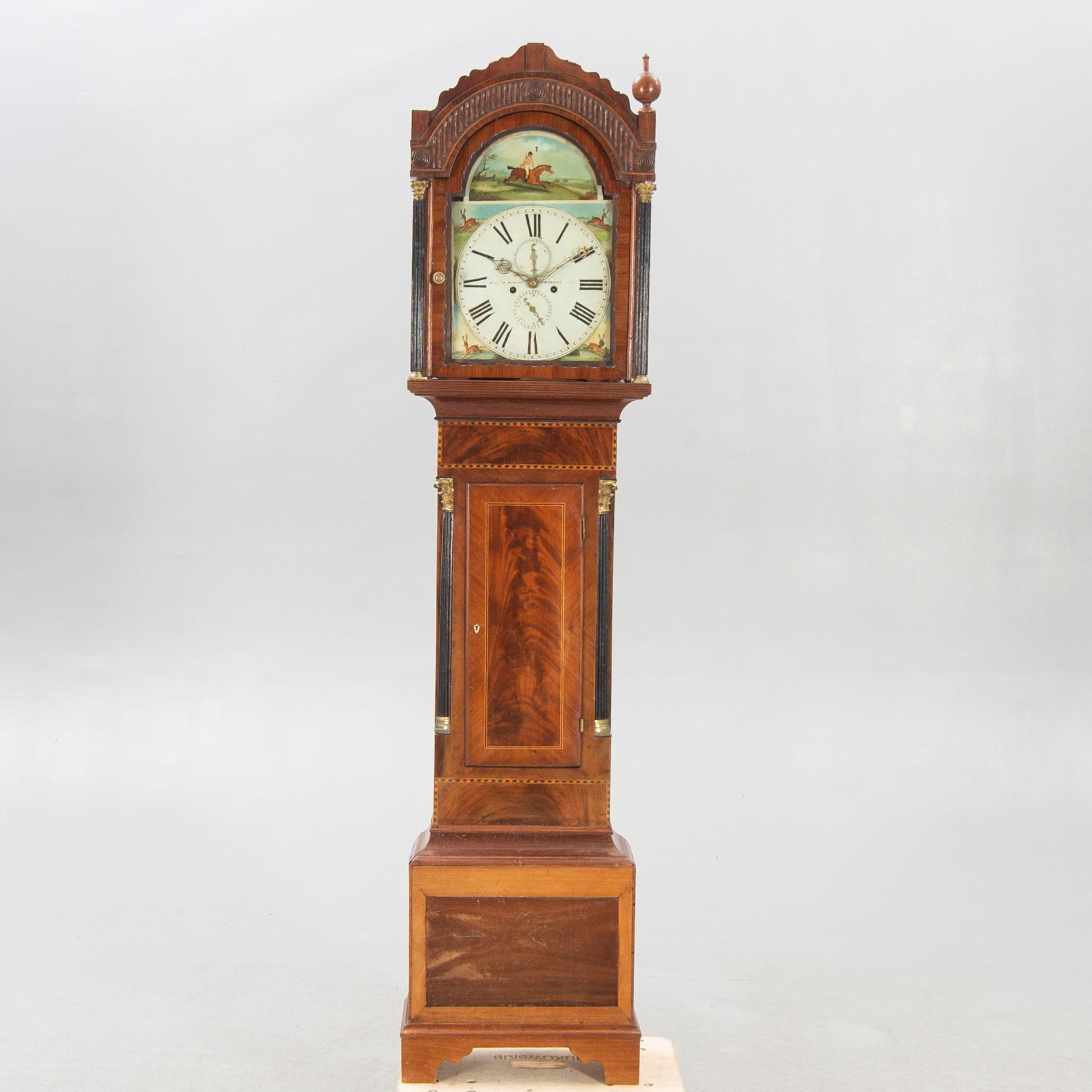 An English W Wilson Newcastle mahogany grand father clock first half of the 19th century.