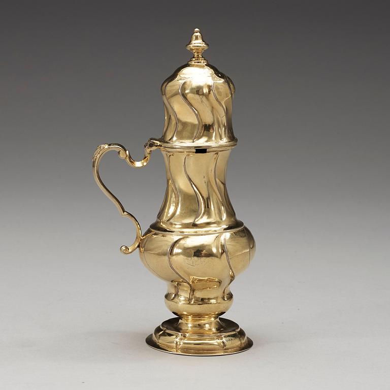 A Baltic mid 18th century silver-gilt mustard-pot, marks of Johann Christian Henck, Riga 1756-1760.