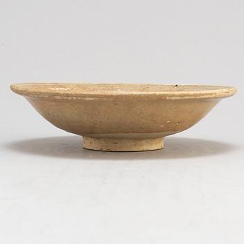 A glazed ceramic dish, presumably Yuan dynasty (1279-1368).