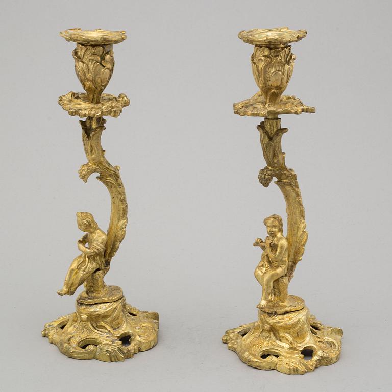 A PAIR OF ORMOLU ROCOCO STYLE CANDLESTICKS, 19th century.