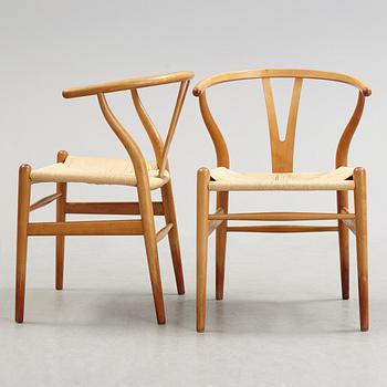 A set of four + two armchairs 'Y-chair' by Hans J Wegner, Carl Hansen & Son, Denmark.