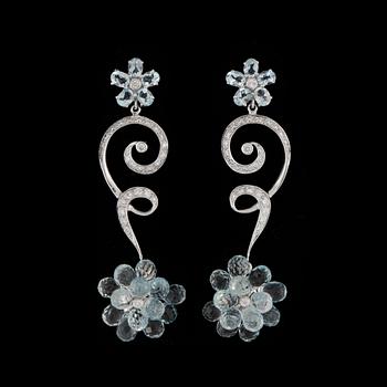 182. A pair of diamond and aquamarin earrings.