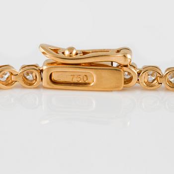 ARMBAND, 18K guld med briljantslipade diamanter ca 1.00 ct. Vikt 5,4 gram.