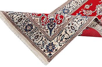 A runner carpet, Nain, part silk, 9 laa, c. 378 x 84 cm.