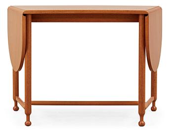 A Josef Frank mahogany table by Svenskt Tenn, model no 1333.