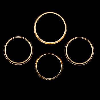RINGAR, 4 st, 18 k guld, 1900-talets andra hälft. Vikt ca 22 gram.