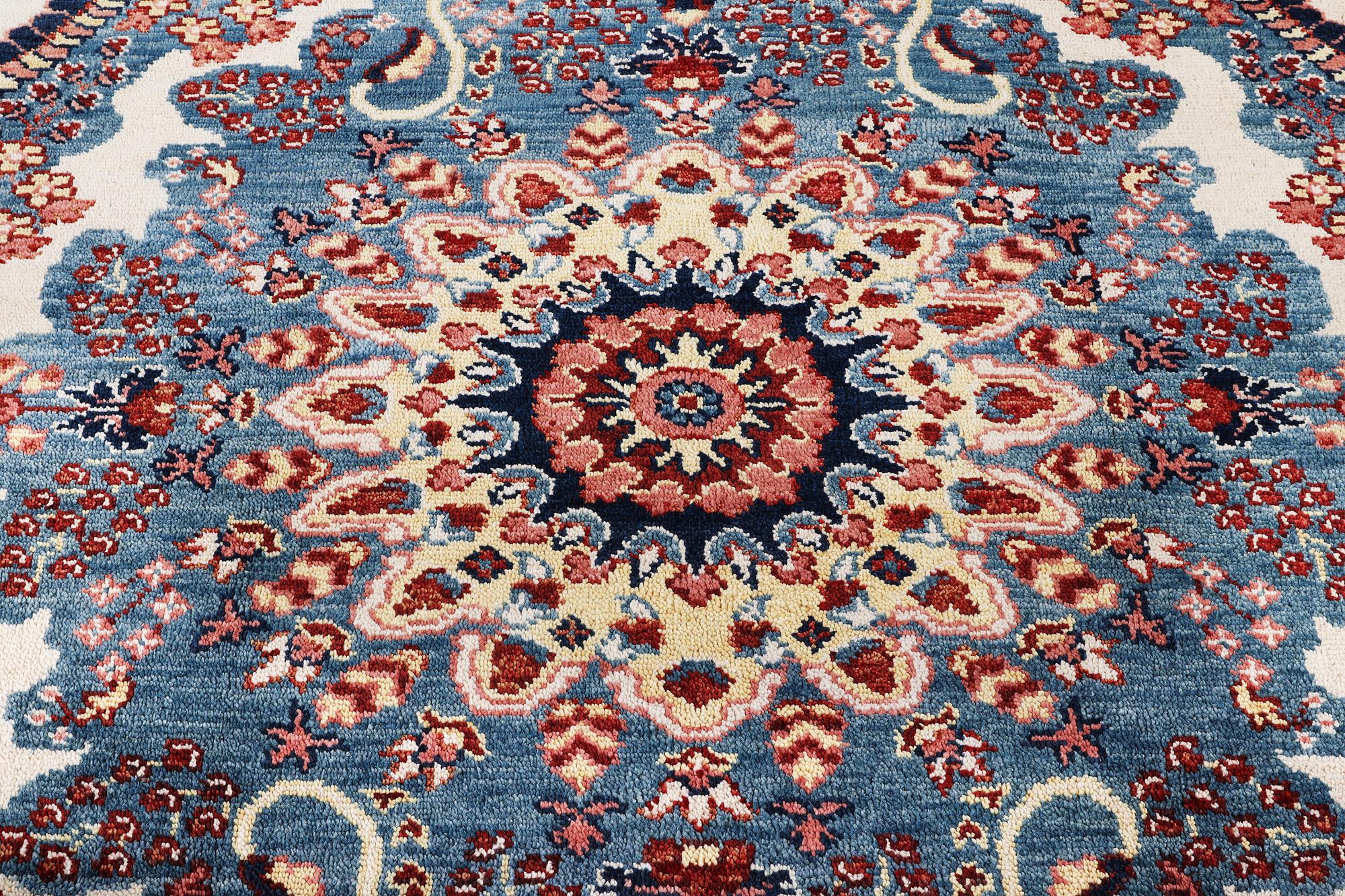 An oriental carpet with Mamluk design, c. 300 x 242 cm.