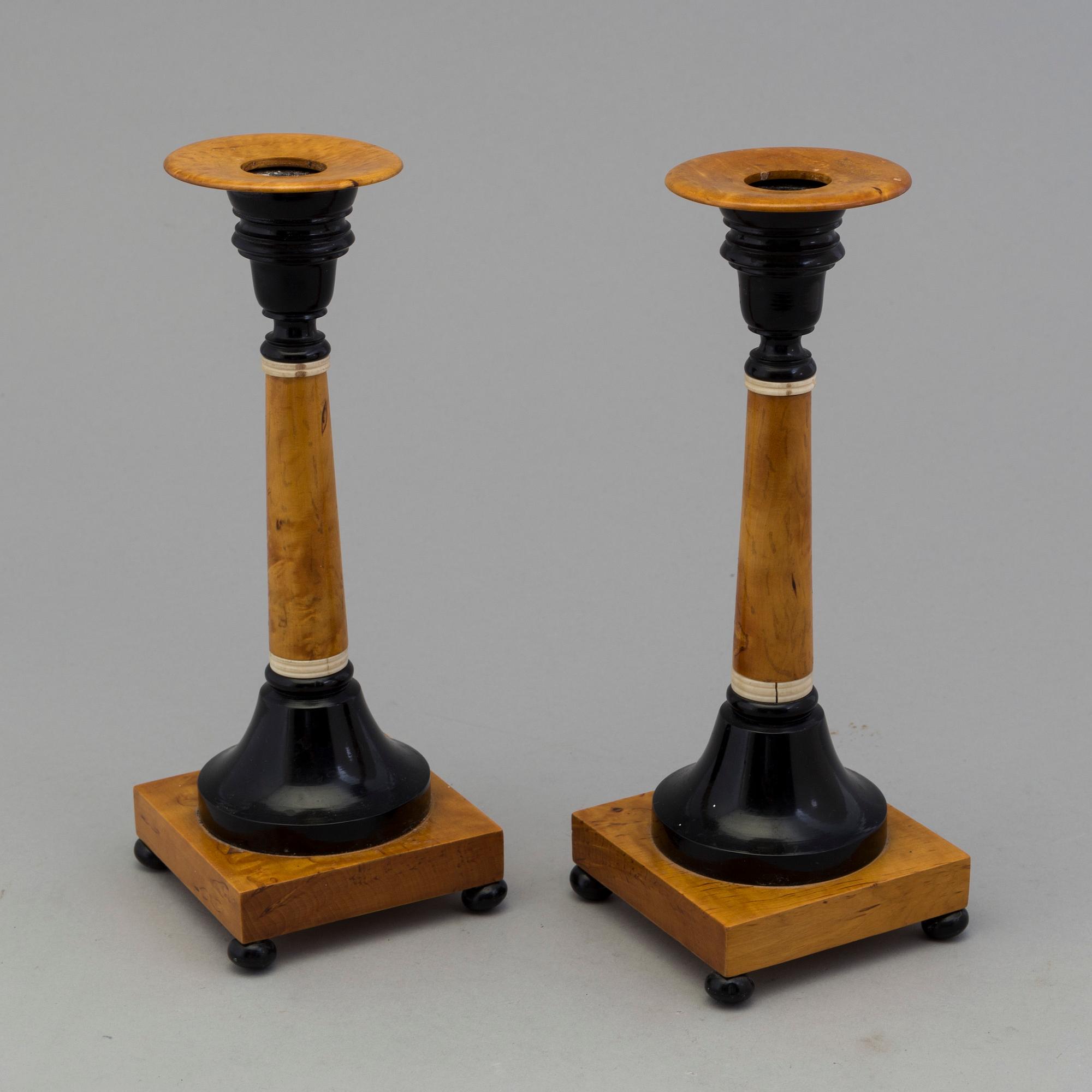 A pair of birch candles by Karl A Axelsson, konstsvarvare, Eksjö, 1907.