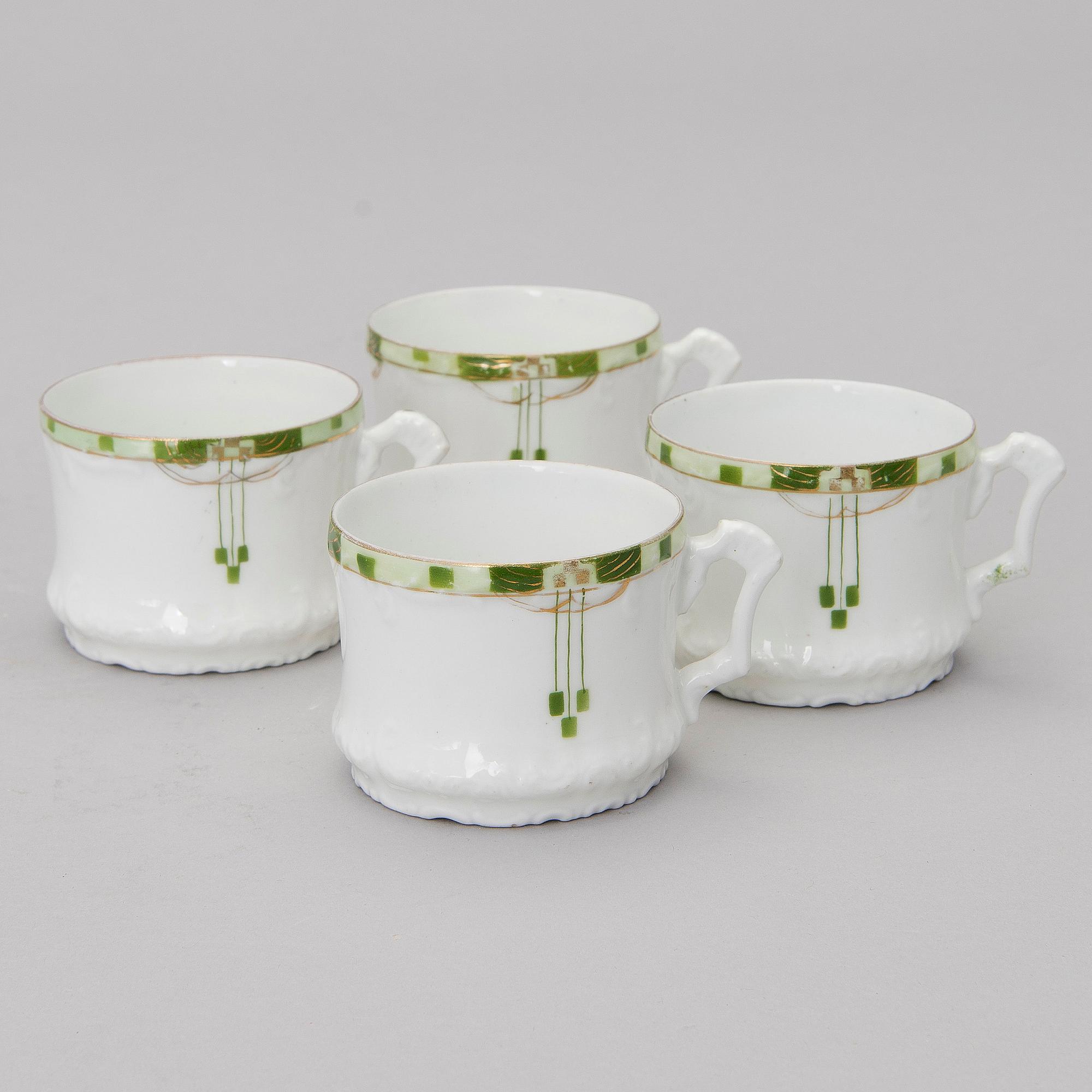 A set of four Kuznetsov porcelain coffee cups with saucers, export marked Fabrique Kousnetzoff, 1890-1913.