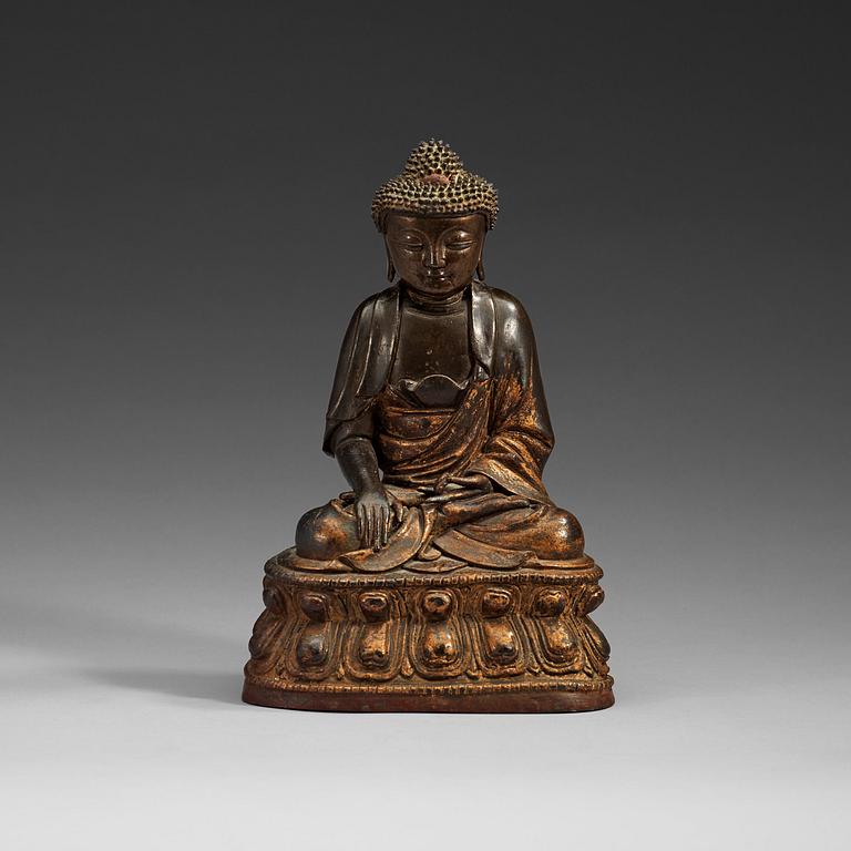A gilt bronze figure of Buddha Sakyamuni, Ming dynasty (1368-1644).