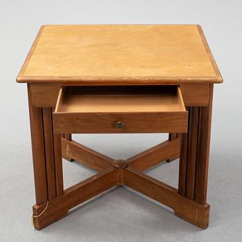 A mahogany and birch center table, 1910's/20's.