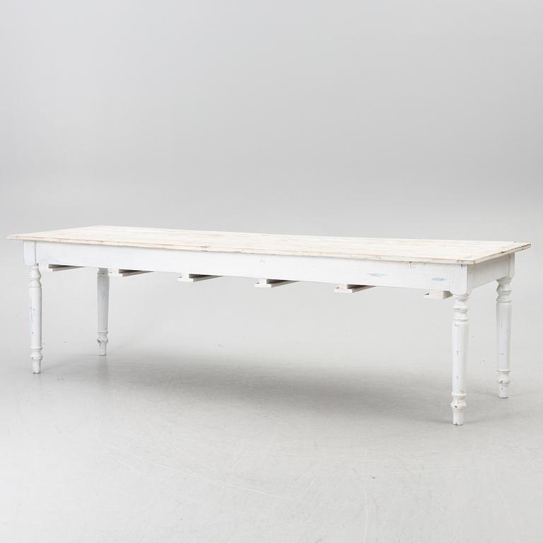 A table with stools, 20th/21st century.