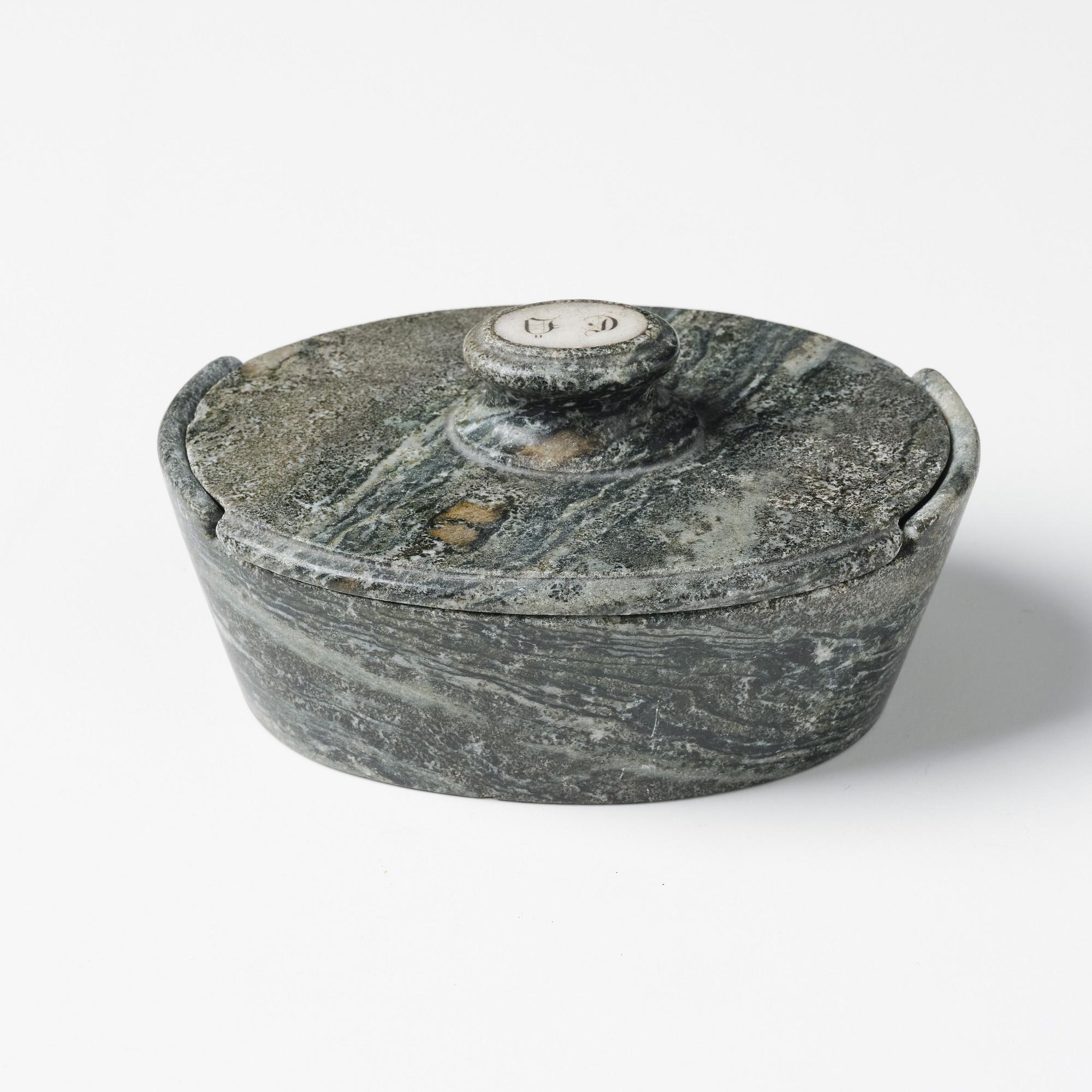 A Swedish Empire 'Kolmård' marble butter box with cover, early 19th century.