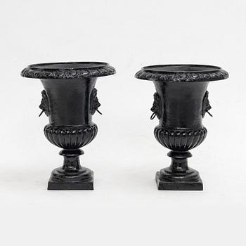 Garden urns, a pair, cast iron, 20th century.