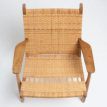 Hans J. Wegner, an oak "CH-27" easy chair, Carl Hansen & Son, Denmark, 1950-60's.