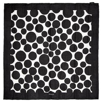 429. GUCCI, a black and white scarf.