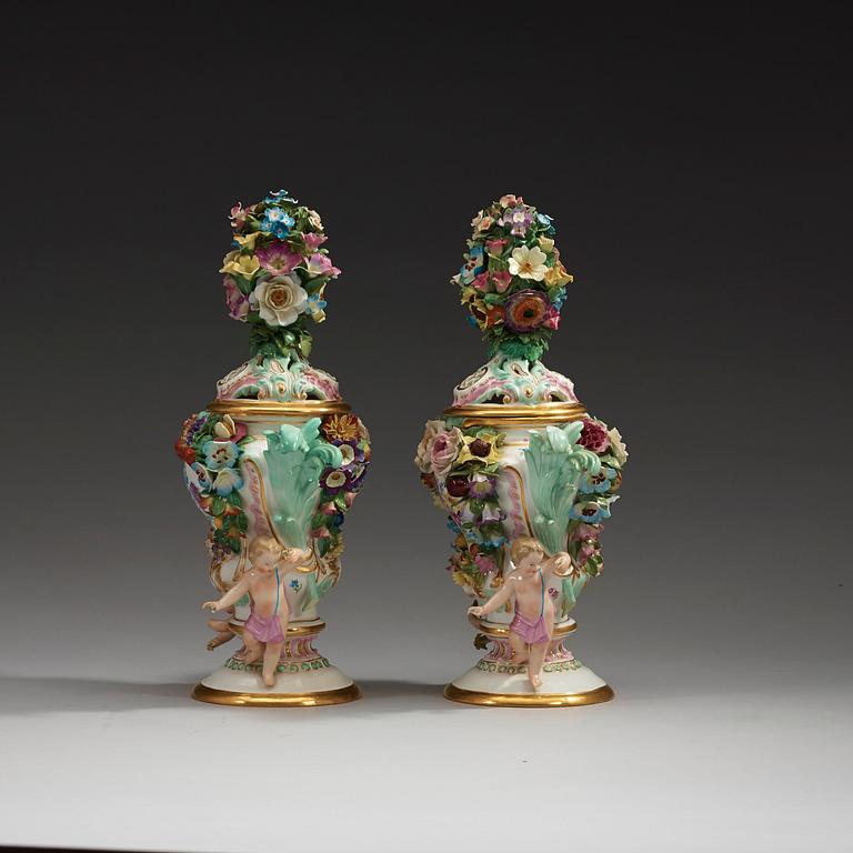 A pair of Meissen pot-purri jars with covers, 19th Century.