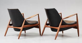 A pair of Olof Persson 'Seal' teak and black leather easy chairs, Olof Persson Möbler, Jönköping 1950's-60's.