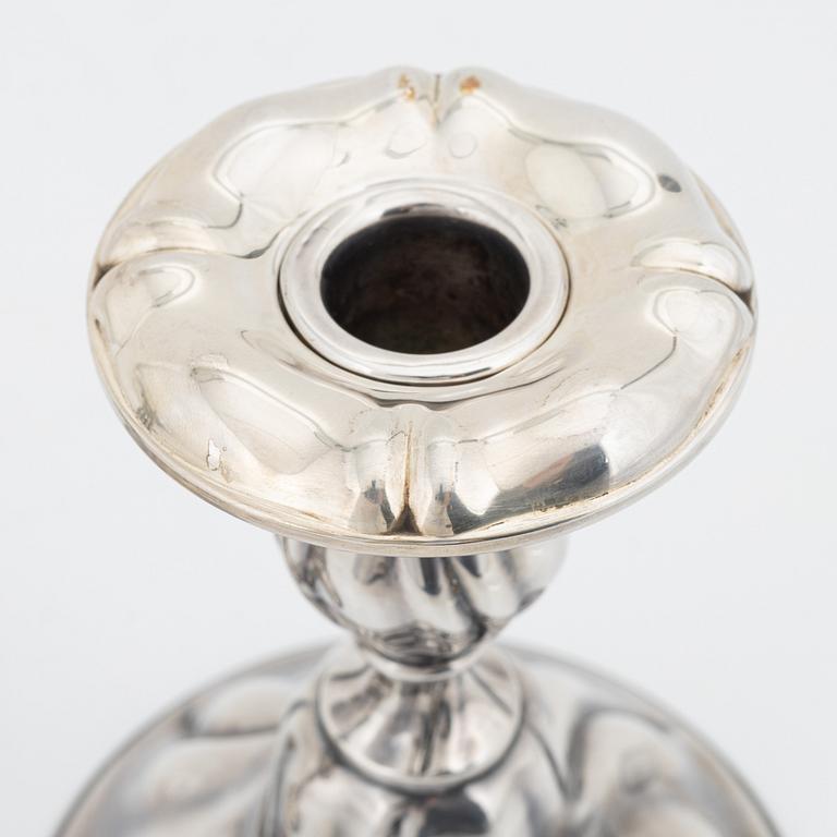 A pair of Rococo style silver candlesticks, Norway, bearing Swedish import marks, 1937.