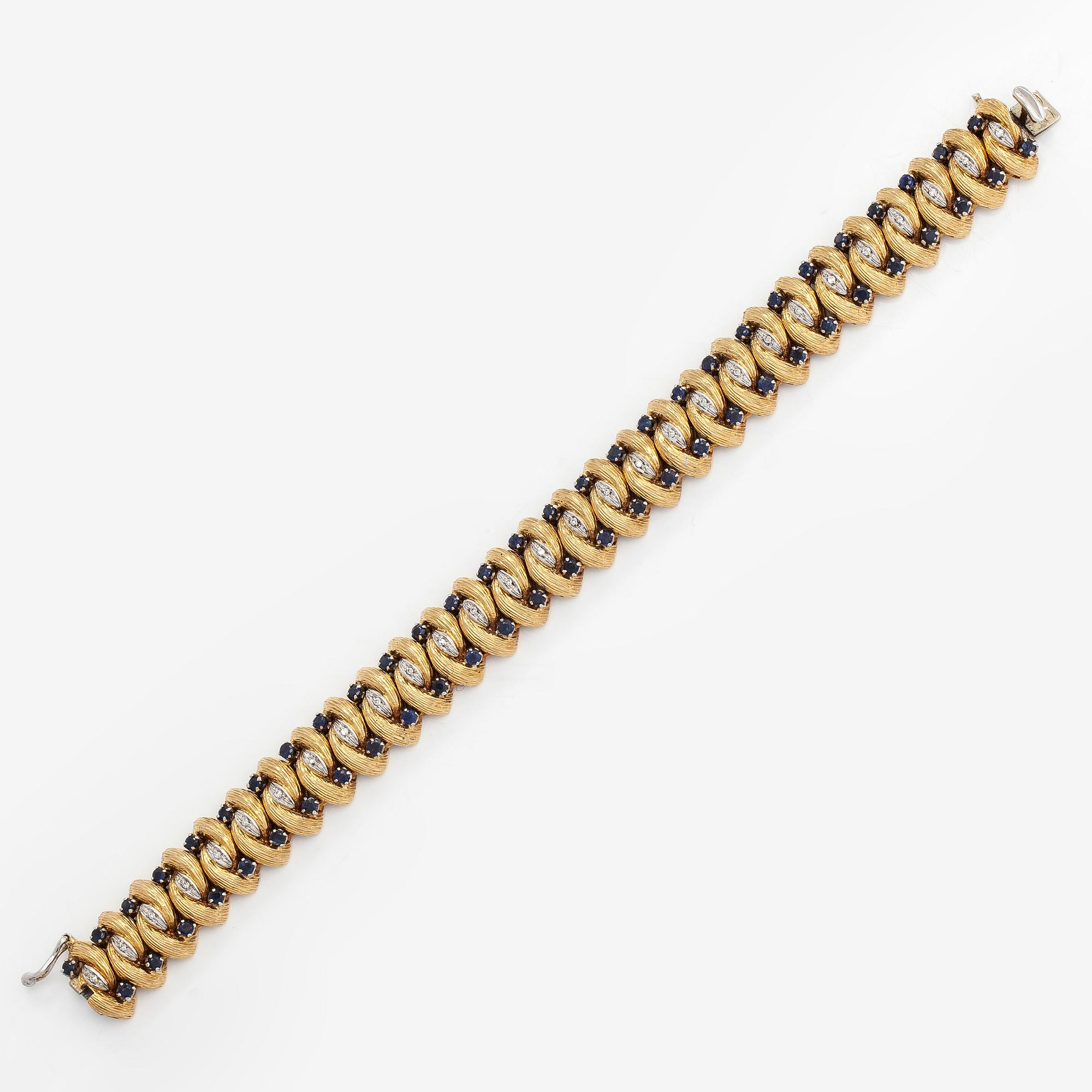 An 18K gold bracelet, diamonds approx. 0.14 ct in total and sapphires, Italy. Finnish import marks.