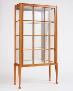 Josef Frank, a walnut showcase cabinet, Svenskt Tenn, Sweden, model B 2217, probably 1950s.