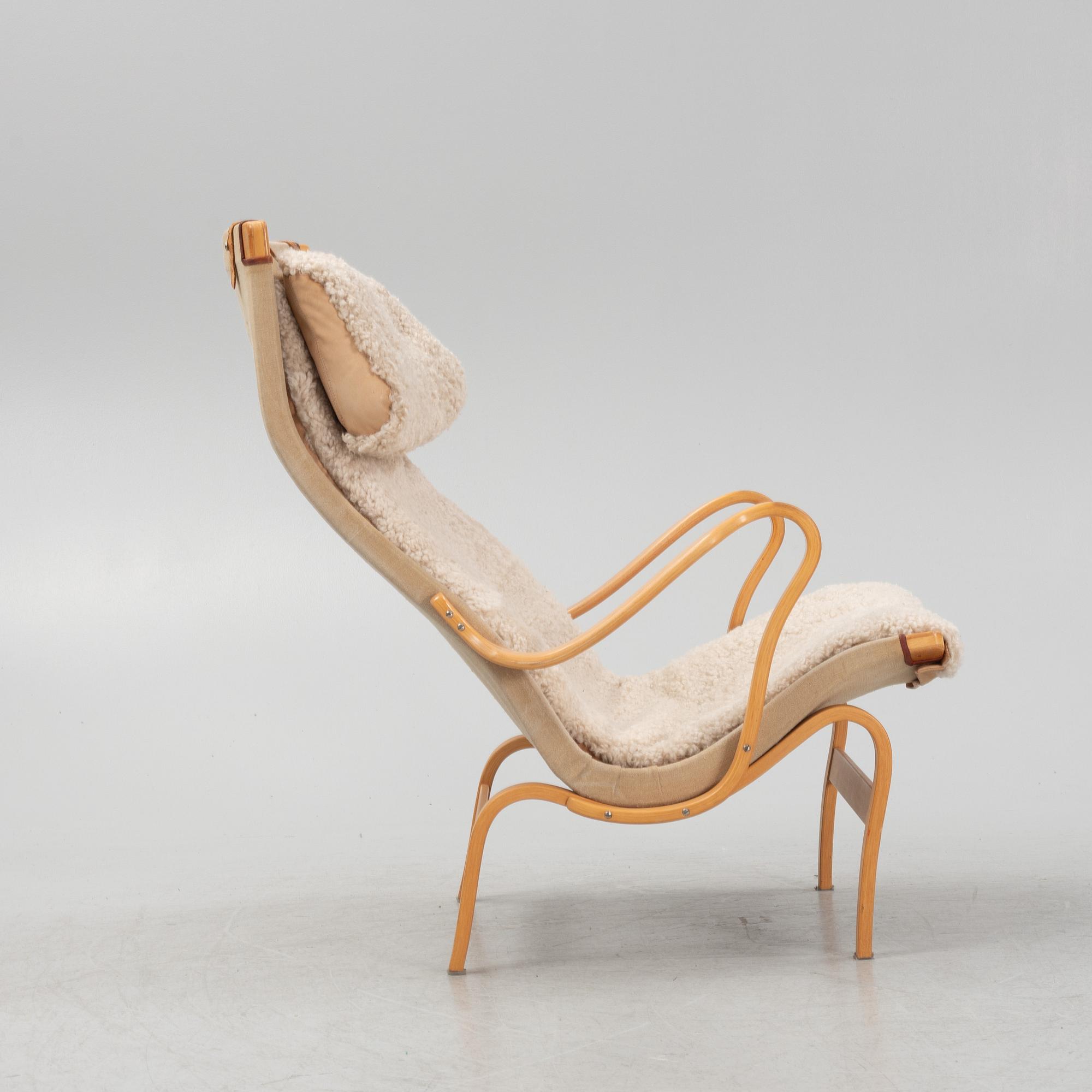Bruno Mathsson, a 'Pernilla' armchair, Dux, late 20th century.