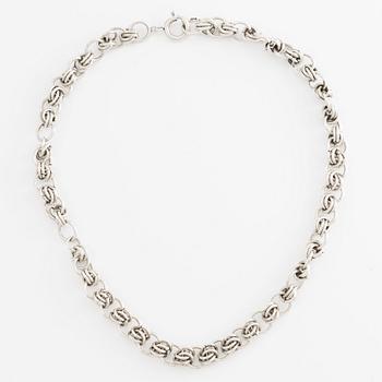 Silver necklace.