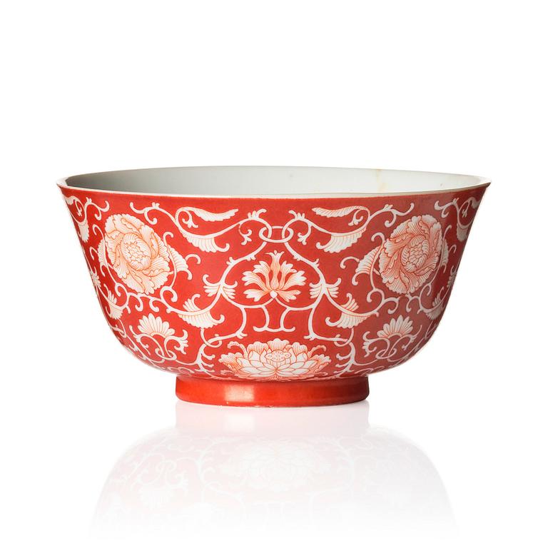 A coral red reverse decorated floral bowl, seal mark of Daoguang, Republic, 20th century.