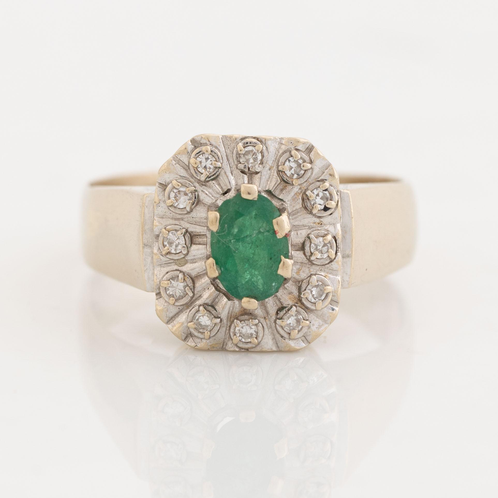 Emerald and diamond ring.