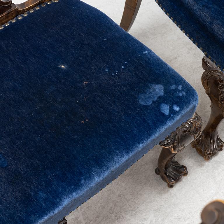 A set of nine Chippendale style chairs, early 20th Century.