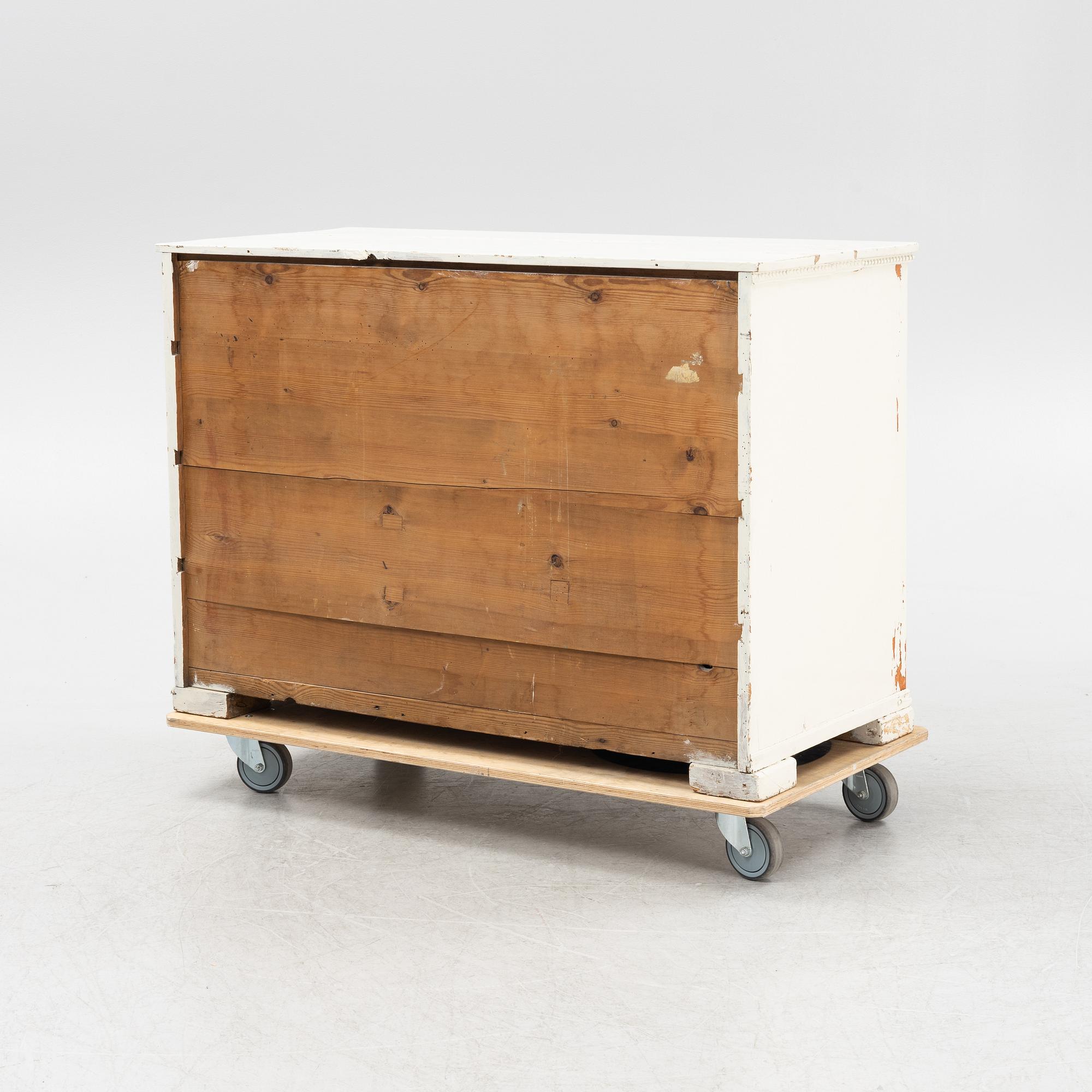 A painted chest of drawers, 19th Century.