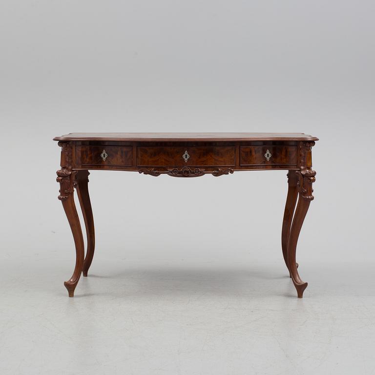 a neo rococo desk from the late 19th century.