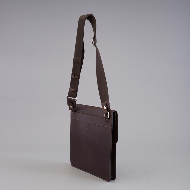 THOMAS SANDELL, a leather bag from Palmgrens.