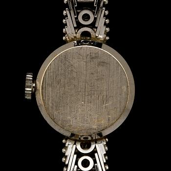 KLOCKA, 18k vitguld med 26 åttkantslipade diamanter, Pagy, Schweiz, 1900-tal. Vikt 24 g.